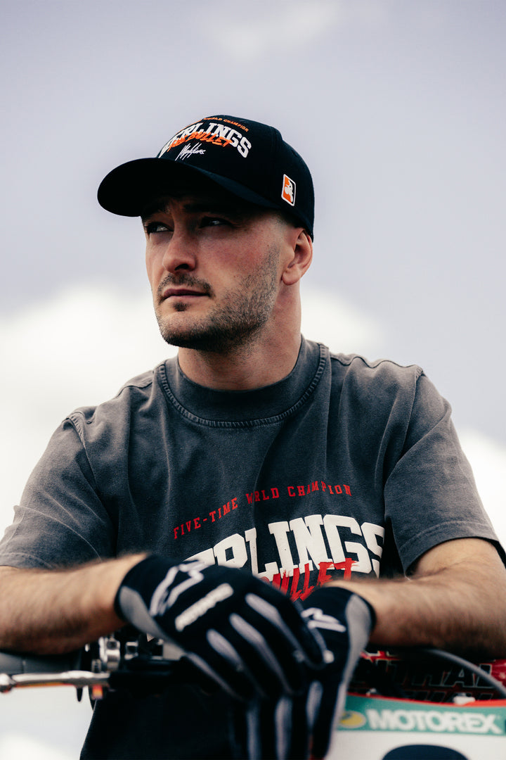Jeffrey_Herlings_Bullet_Baseball_Cap_Black-Orange_Campagne_01.jpg