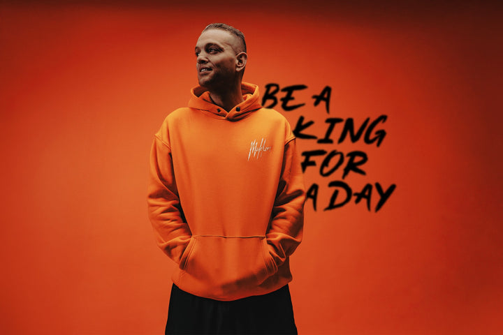 Chahid Charrak in Malelions Koningsdag oranje trui