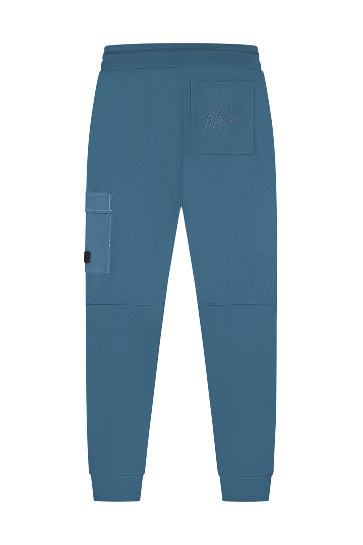 MM1-AW25-28_970_Malelions_Men_Nylon_Pocket_Sweatpants_Blue_Slate_Back.png