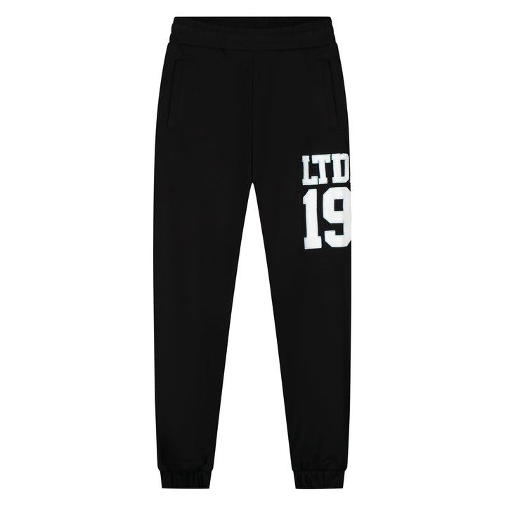 MWB50026039_49001_Malelions_Women_Sherpa_Applique_Match_Sweatpants_Black_Front_4d930812-b90d-4006-b6fb-1b40bcdec0f2.jpg