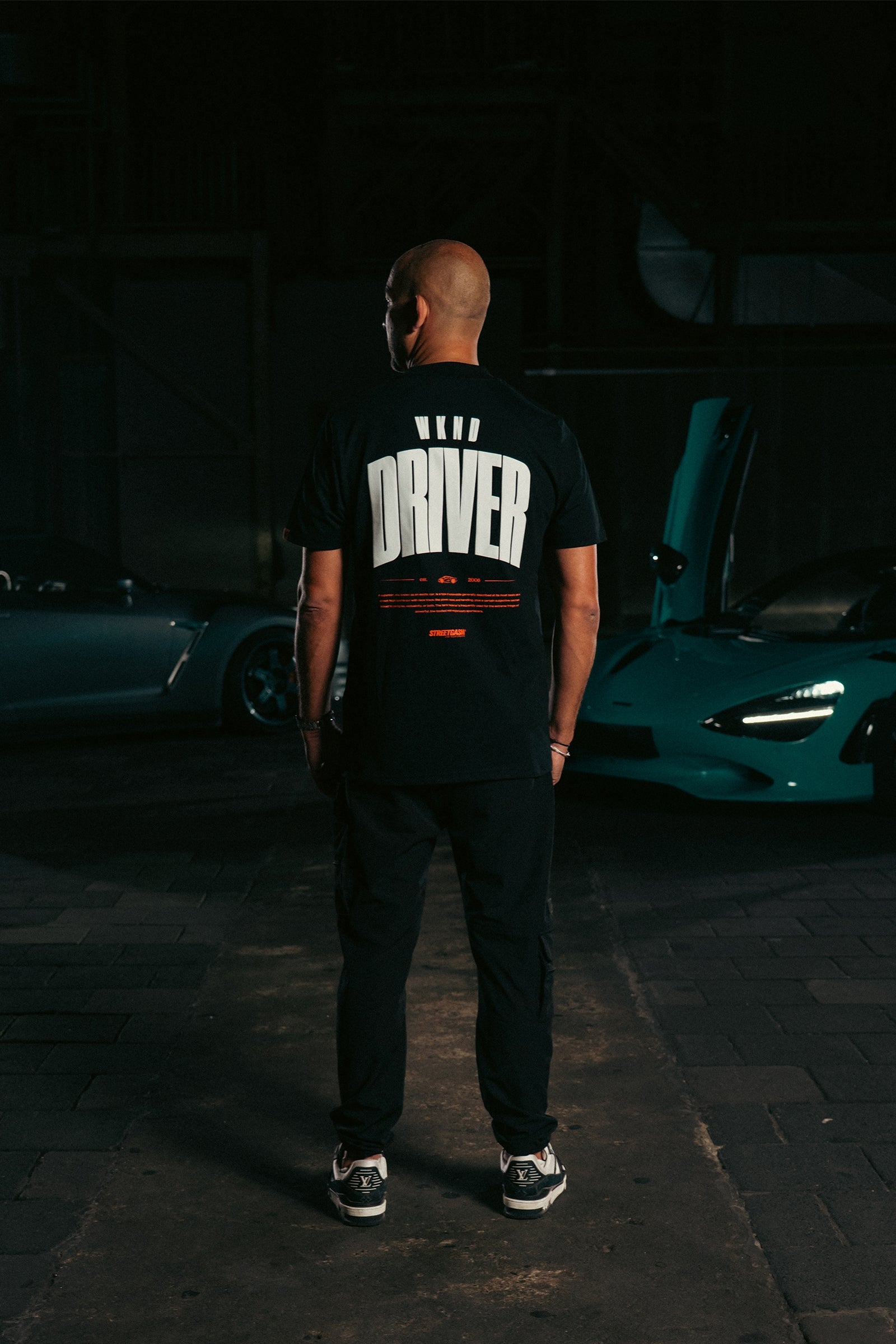 Malelions x Streetgasm WKND Driver T-Shirt | Black
