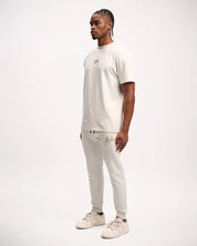 Malelions Men Striped Signature Sweatpants | Off-White/Taupe